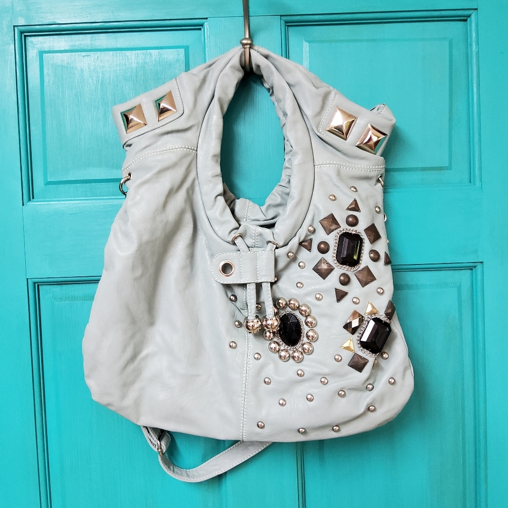 Light blue, leather, Nicole Lee purse.